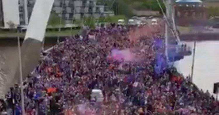 Rangers fans on march from Squinty Bridge to George Square on trophy day
