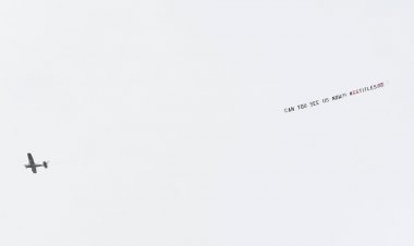 Rangers fans taunt Celtic with aeroplane banner flown above Tannadice