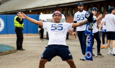Alfredo Morelos sips champagne as he celebrates Rangers title glory