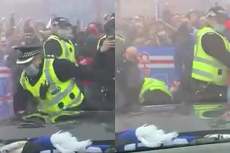 Watch: Ibrox police officer takes tumble as Steven Gerrard enters stadium to thousands of fans with flares