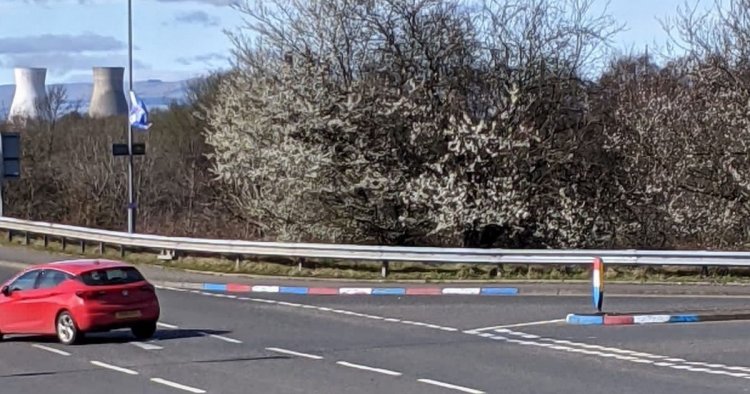 Rangers fans paint kerbs town red, white and blue in Scots ahead of Celtic clash