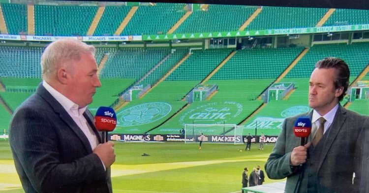 Ally McCoist stands on a box as he provides punditry on Sky