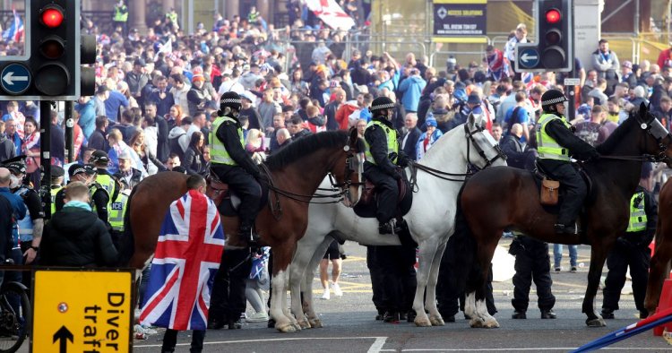 Police arrest 28 people after 'ugly' Rangers celebrations as five cops injured