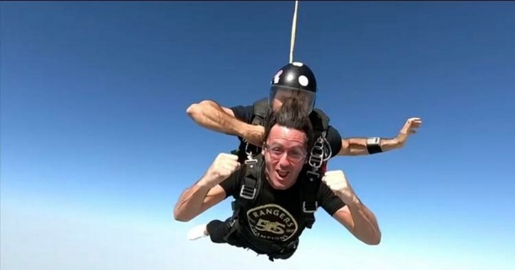 Glow's Brian Matthews marks Rangers 55 title celebrations with skydive